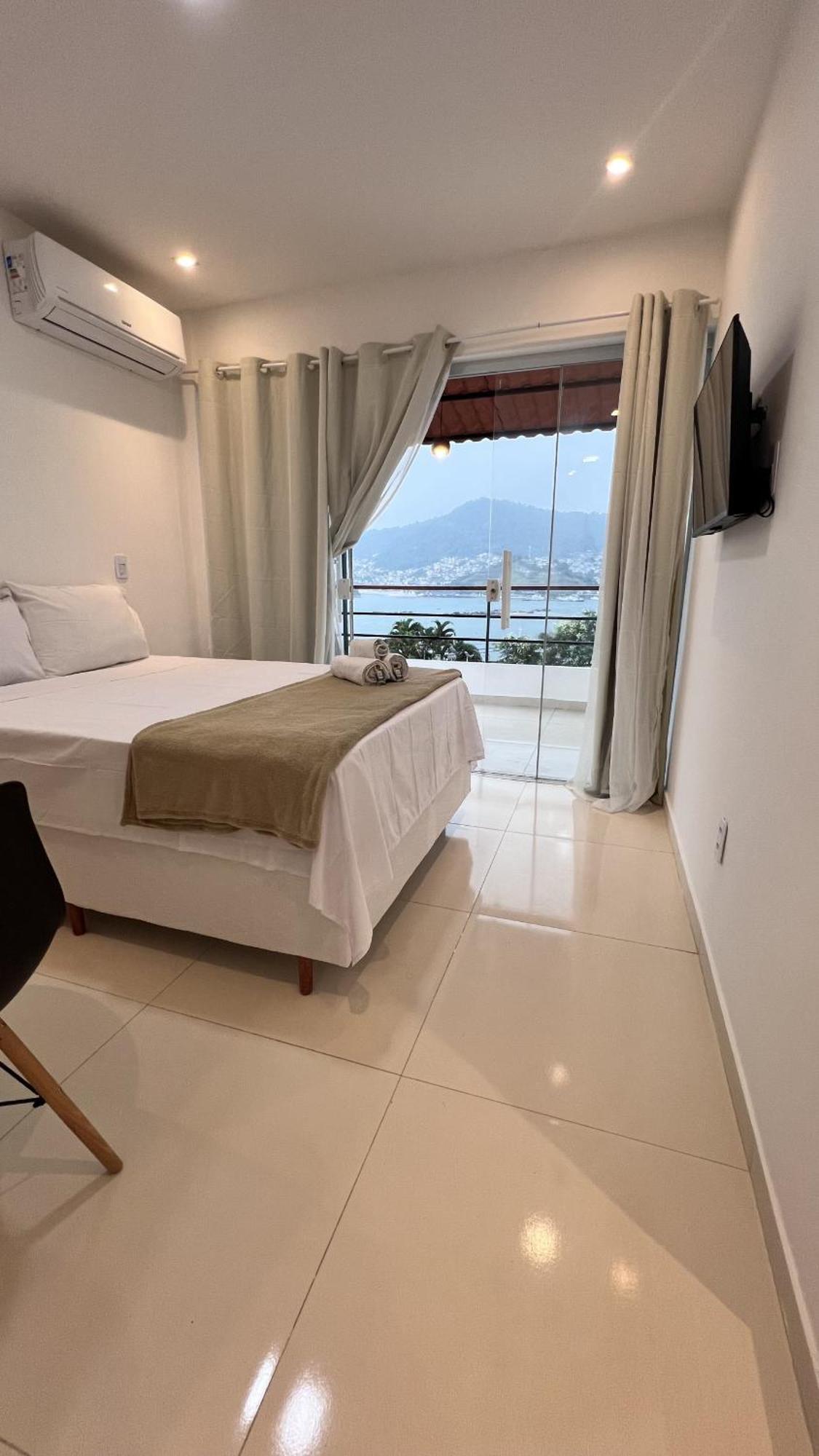 Apartamentos Com Vista Para O Mar - Mirante Do Marinas 安格拉杜斯雷斯 外观 照片