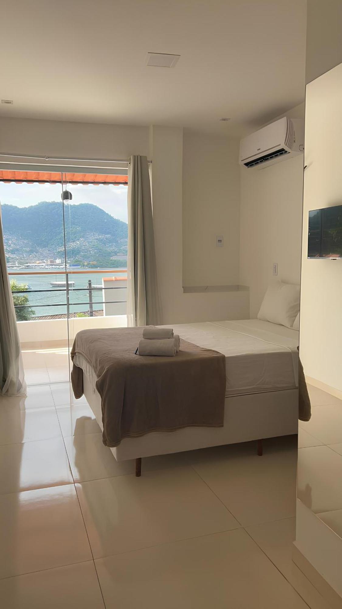 Apartamentos Com Vista Para O Mar - Mirante Do Marinas 安格拉杜斯雷斯 外观 照片
