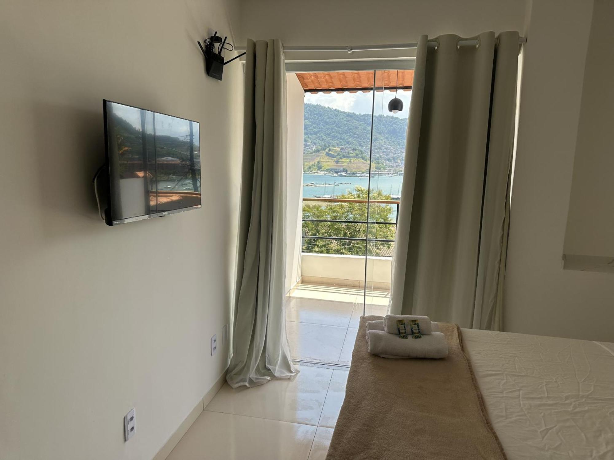 Apartamentos Com Vista Para O Mar - Mirante Do Marinas 安格拉杜斯雷斯 外观 照片